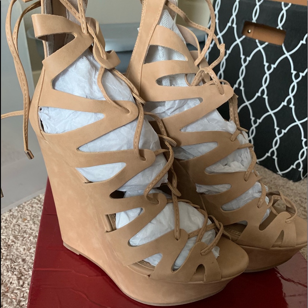 NIB Tan gladiator wedge sandals.